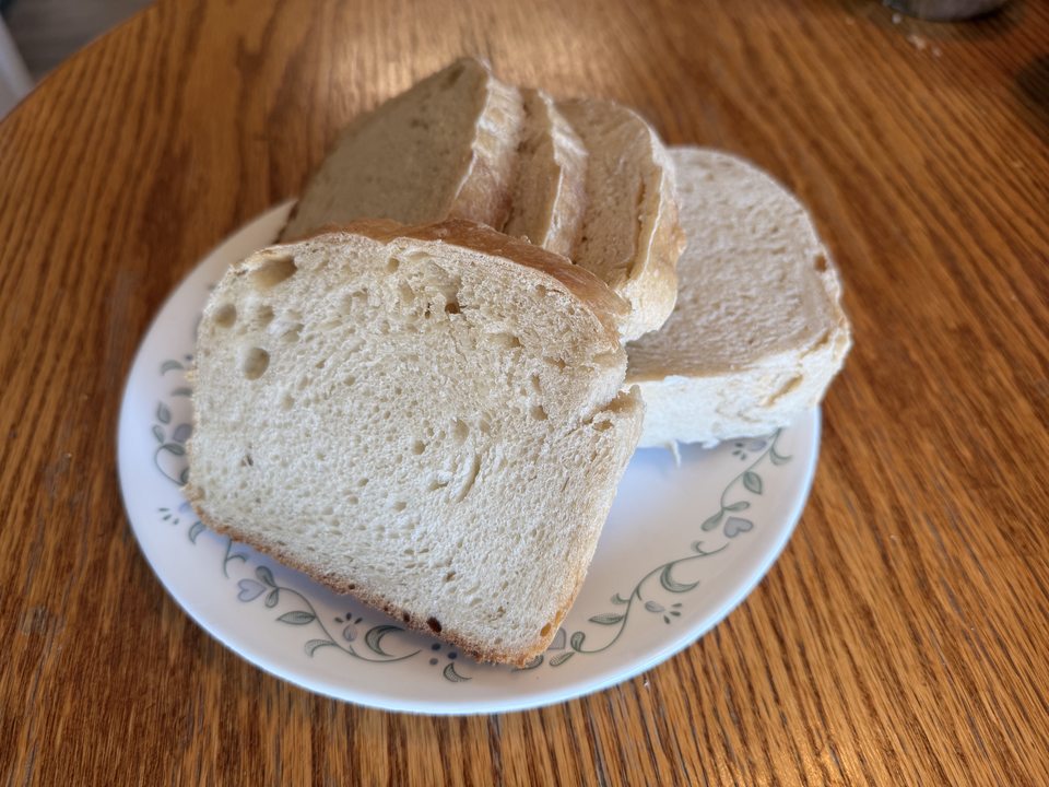 Slices of classic sourdough bread arranged on a plate